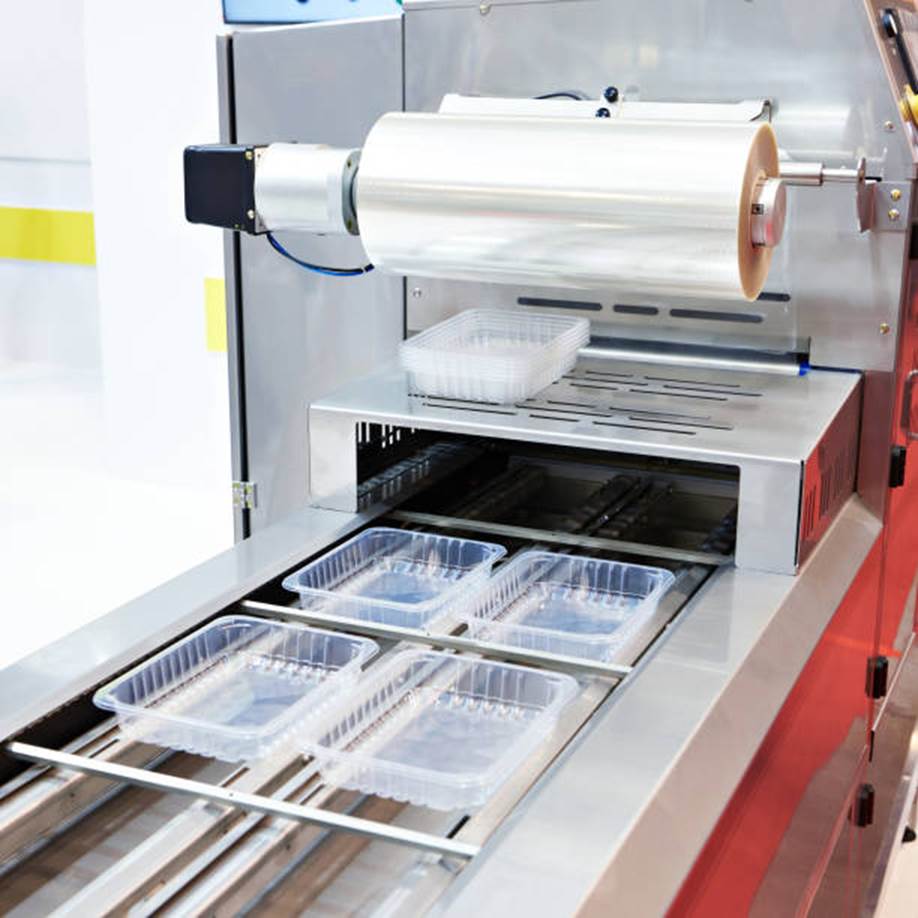 Automatic packing and sealing machine; Custom metal badges designer and manufacturer