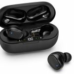Black wireless earbuds in a charging case with LED status display showing L, R, and battery indicator (100%).